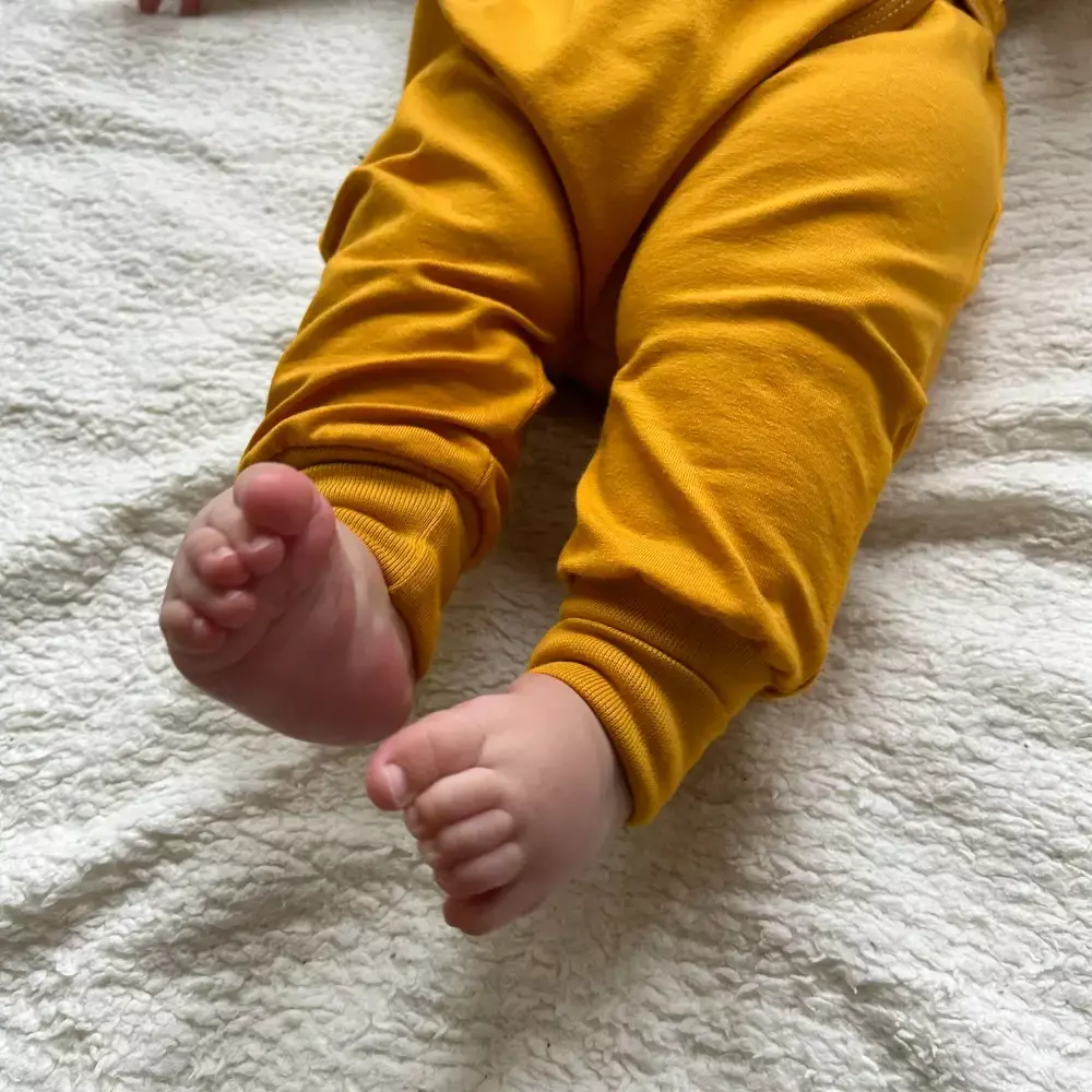 Kojenecký rostoucí overal - hořčičný